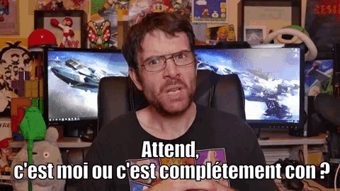 a man wearing glasses and a shirt that says attend