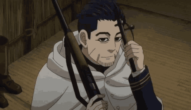 a man in a white cape holds a gun