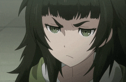 a close up of a girl with green eyes