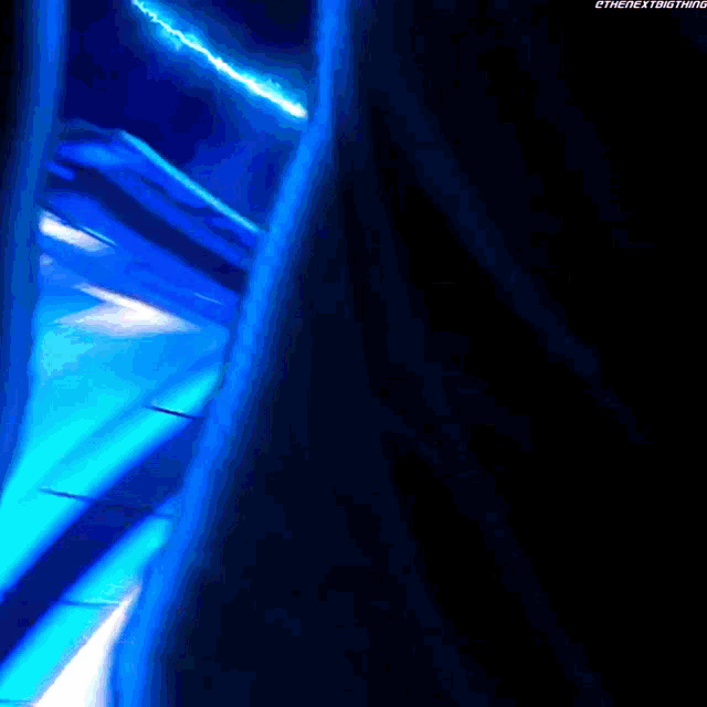 a blue lightning bolt is coming down from the sky