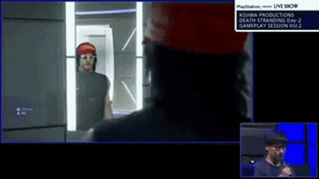 a man in a red hat is standing in front of a mirror with the words kojima productions death stranding on the screen