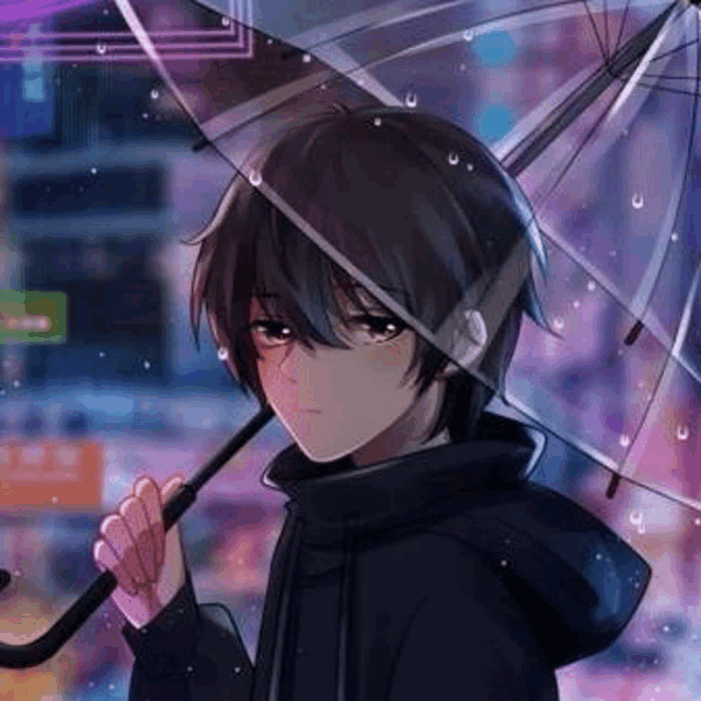 a young boy is holding a clear umbrella in the rain .