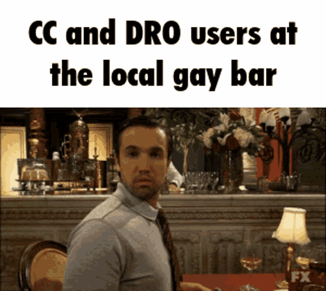 a man sitting at a table in front of a bar with the caption cc and dro users at the local gay bar