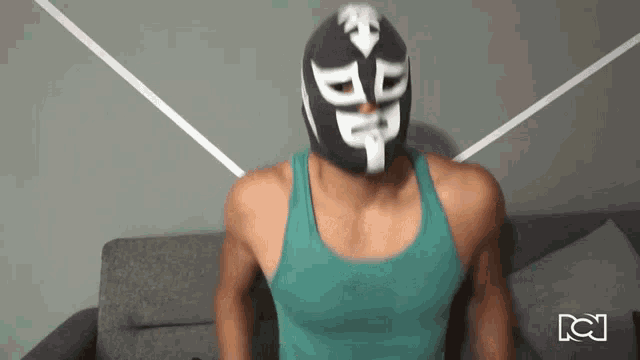 a man wearing a mask with the letters dp on it
