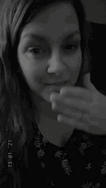 a black and white photo of a woman with the date of 15 01 21