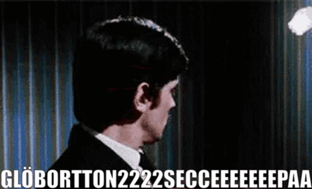 a man in a suit and tie says globortton222secceeeeepaa