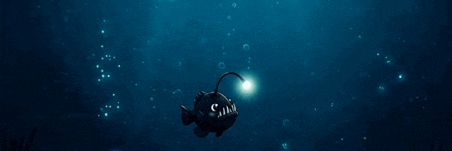 a fish with the letter s on its mouth is swimming in the water