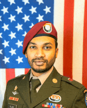 a man in a military uniform with the name alam on his chest