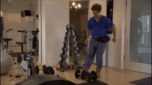 Adam Lifts GIF - Workaholics Working Out Weights GIFs