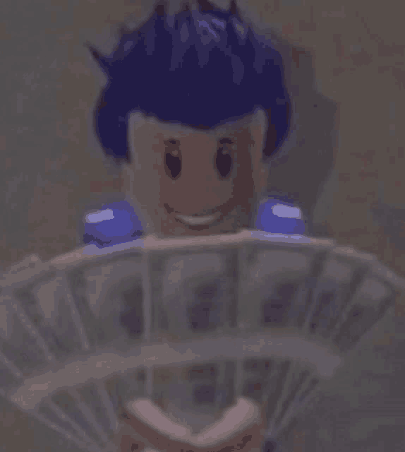 a person is holding a fan of money and smiling .