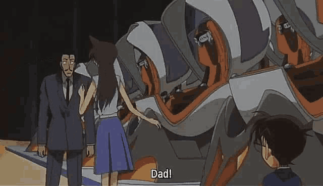 a man and a woman are standing in front of a machine and the woman is crying .