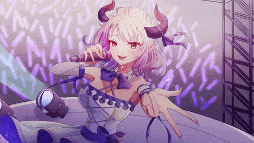 a girl with horns is holding a microphone