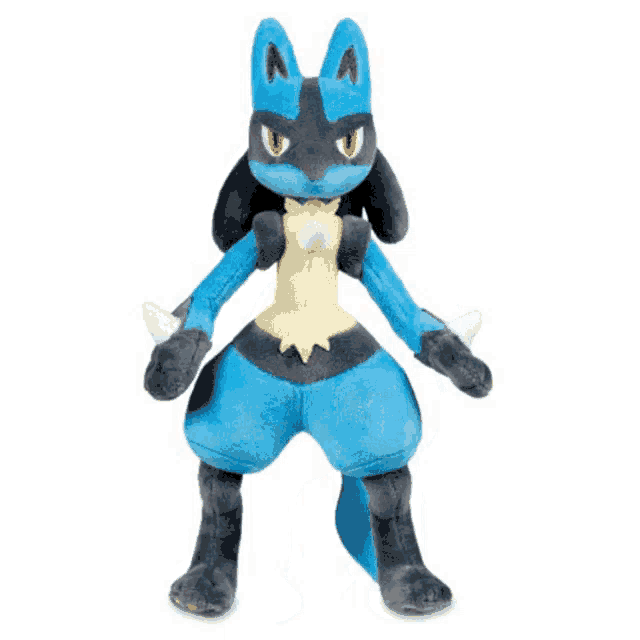 a blue and black stuffed animal with red eyes and sharp claws