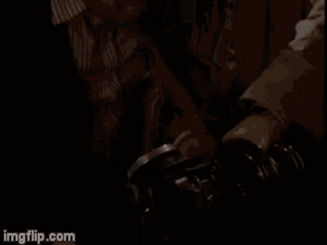 a close up of a person 's foot on a pedal with the website imgflip.com in the lower right corner