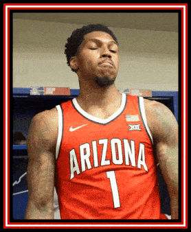 a basketball player wearing a red arizona jersey