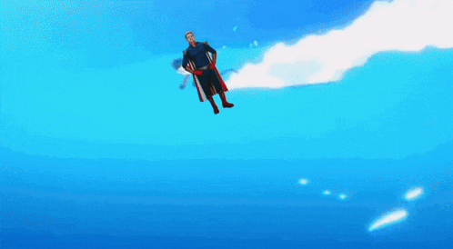 a man in a superman costume is flying through a blue sky
