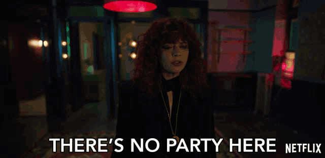 a woman says there 's no party here in a dark room