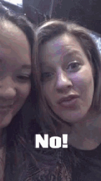 two women are posing for a picture with the word no on the bottom right