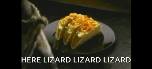 a person is reaching for a plate of tacos with the words `` here lizard lizard lizard '' .