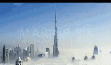 a city skyline with the word making visible in the corner