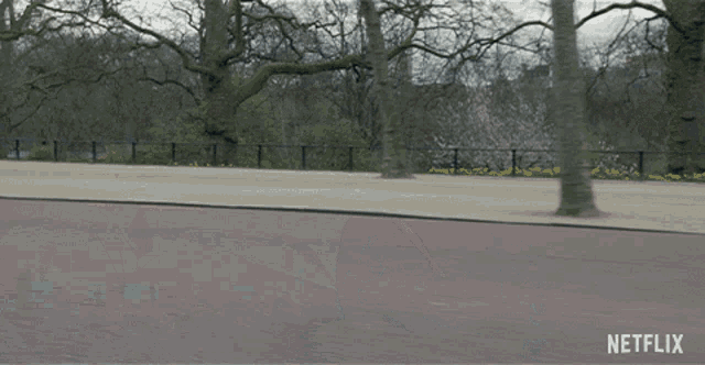 Riding A Motorcycle The Crown GIF - Riding A Motorcycle The Crown Strolling GIFs