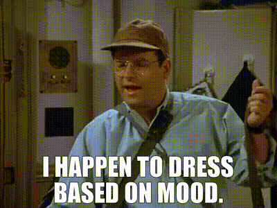 a man wearing a baseball cap and tie says i happen to dress based on mood .