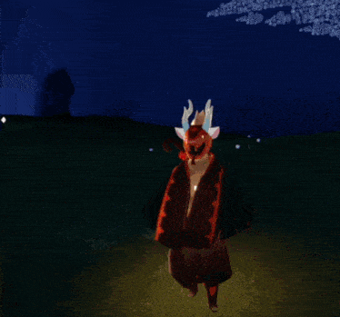a deer with horns is standing in a field