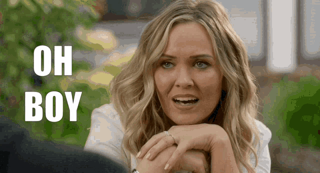 a woman with a surprised look on her face and the words oh boy above her