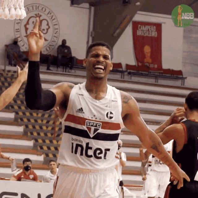 a basketball player wearing a jersey that says inter