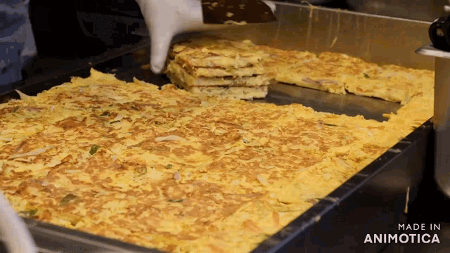 a tray of food with the words made in animotica at the bottom
