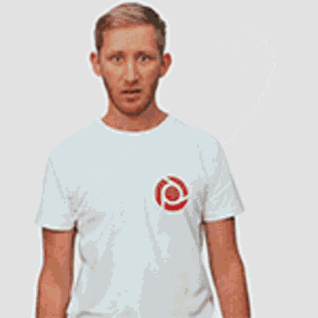 a man wearing a white t-shirt with a target logo on it is covering his ear with his hand .
