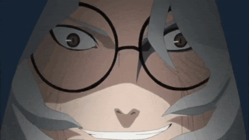 a close up of a person 's face with glasses and gray hair