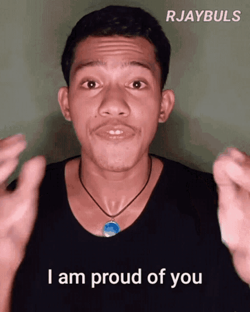 a man says i am proud of you with his hands up