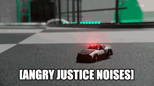 a toy police car is sitting on the ground with the caption angry justice noises !
