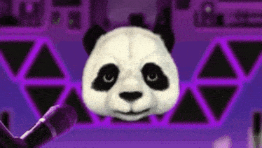 a panda bear is singing into a microphone in front of a purple background .