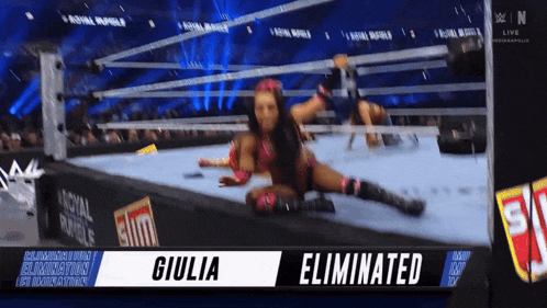 a female wrestler is eliminated from a wrestling match