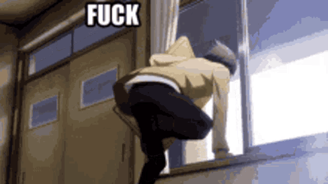 a man is climbing out of a window with the word fuck written on it