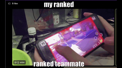 a person is playing a video game on their phone with the words my ranked ranked teammate