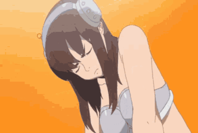 a girl with long hair and a blue headband is laying down