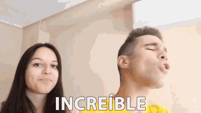 a man and a woman are standing next to each other with the word increible written above them