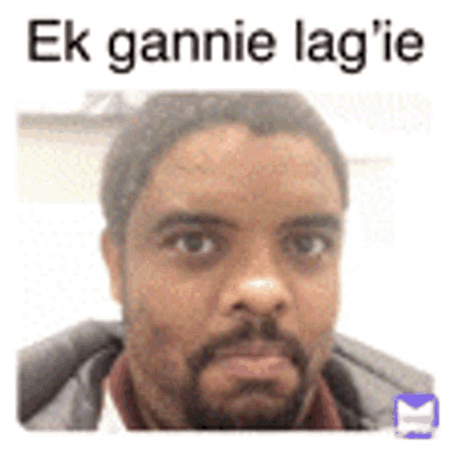 a man with a beard is looking at the camera with the words `` ek gannie lag 'ie '' written below him .