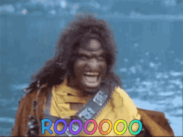 a picture of a man with a rainbow background that says r00000