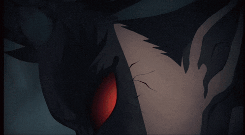 a close up of a person 's eye with a red pupil