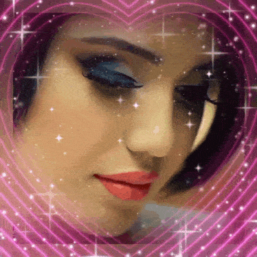 a woman 's face is surrounded by a pink heart