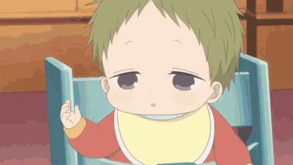 a baby with green hair is sitting in a high chair and giving the middle finger .