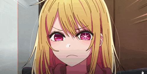 a girl with blonde hair and red eyes is making an angry face .