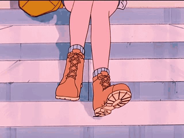 a cartoon drawing of a person 's feet wearing orange boots