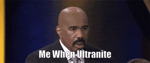 a bald man with a mustache is sitting in front of a blue background and says me when ultranite .