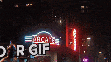 a man carrying a tray in front of a neon sign that says arcade