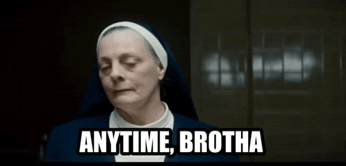 a nun is saying anytime brotha in a dark room .